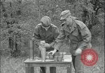 Image of 105mm HE smoke shell leaflet replacement Fort Riley Kansas USA, 1951, second 48 stock footage video 65675078828