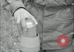 Image of 105mm HE smoke shell leaflet replacement Fort Riley Kansas USA, 1951, second 52 stock footage video 65675078828