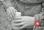 Image of 105mm HE smoke shell leaflet replacement Fort Riley Kansas USA, 1951, second 56 stock footage video 65675078828