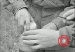 Image of 105mm HE smoke shell leaflet replacement Fort Riley Kansas USA, 1951, second 61 stock footage video 65675078828