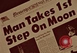 Image of Apollo 11 photos newspaper headlines United States USA, 1969, second 51 stock footage video 65675078852