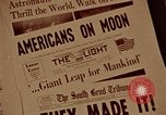 Image of Apollo 11 photos newspaper headlines United States USA, 1969, second 59 stock footage video 65675078852