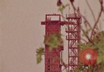 Image of Saturn rocket moving crawler-transporter Florida United States USA, 1970, second 17 stock footage video 65675078854