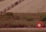 Image of Saturn rocket moving crawler-transporter Florida United States USA, 1970, second 49 stock footage video 65675078854