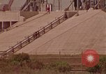 Image of Saturn rocket moving crawler-transporter Florida United States USA, 1970, second 50 stock footage video 65675078854