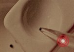Image of moon rock analysis United States USA, 1972, second 19 stock footage video 65675078860