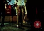 Image of traffic night life dancing DMZ Seoul Korea, 1969, second 47 stock footage video 65675078895