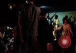 Image of traffic night life dancing DMZ Seoul Korea, 1969, second 57 stock footage video 65675078895