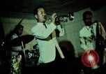 Image of traffic night life dancing DMZ Seoul Korea, 1969, second 59 stock footage video 65675078895