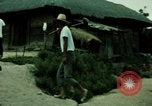 Standbild Koreanische Bauern Bewässern von Pflanzen Korea, 1969, aus Sekunde 15 historischem Filmmaterial Videoclip 65675078900