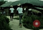Standbild Koreanische Bauern Bewässern von Pflanzen Korea, 1969, aus Sekunde 16 historischem Filmmaterial Videoclip 65675078900