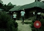 Standbild Koreanische Bauern Bewässern von Pflanzen Korea, 1969, aus Sekunde 19 historischem Filmmaterial Videoclip 65675078900