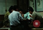 Standbild Koreanische Bauern Bewässern von Pflanzen Korea, 1969, aus Sekunde 42 historischem Filmmaterial Videoclip 65675078900