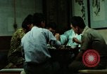 Standbild Koreanische Bauern Bewässern von Pflanzen Korea, 1969, aus Sekunde 44 historischem Filmmaterial Videoclip 65675078900