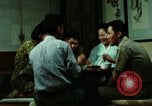 Standbild Koreanische Bauern Bewässern von Pflanzen Korea, 1969, aus Sekunde 45 historischem Filmmaterial Videoclip 65675078900