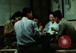 Standbild Koreanische Bauern Bewässern von Pflanzen Korea, 1969, aus Sekunde 46 historischem Filmmaterial Videoclip 65675078900