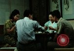 Standbild Koreanische Bauern Bewässern von Pflanzen Korea, 1969, aus Sekunde 48 historischem Filmmaterial Videoclip 65675078900