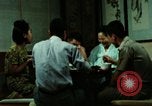 Standbild Koreanische Bauern Bewässern von Pflanzen Korea, 1969, aus Sekunde 51 historischem Filmmaterial Videoclip 65675078900