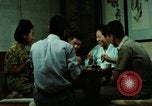 Standbild Koreanische Bauern Bewässern von Pflanzen Korea, 1969, aus Sekunde 53 historischem Filmmaterial Videoclip 65675078900