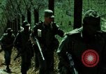 Image of soldiers patrolling Korean DMZ Korea, 1969, second 25 stock footage video 65675078907