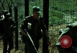 Image of soldiers patrolling Korean DMZ Korea, 1969, second 27 stock footage video 65675078907