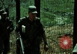 Image of soldiers patrolling Korean DMZ Korea, 1969, second 28 stock footage video 65675078907