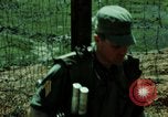 Image of soldiers patrolling Korean DMZ Korea, 1969, second 32 stock footage video 65675078907