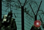 Image of soldiers patrolling Korean DMZ Korea, 1969, second 34 stock footage video 65675078907