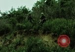 Image of soldiers patrolling Korean DMZ Korea, 1969, second 62 stock footage video 65675078907