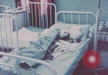 Image of wounded Iranians Iran, 1980, second 18 stock footage video 65675078926