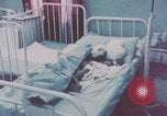 Image of wounded Iranians Iran, 1980, second 19 stock footage video 65675078926