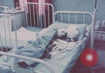 Image of wounded Iranians Iran, 1980, second 20 stock footage video 65675078926