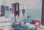 Image of wounded Iranians Iran, 1980, second 32 stock footage video 65675078926