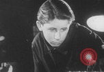 Image of Youth learning to maintain locomotives Germany, 1942, second 46 stock footage video 65675078930