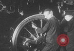 Image of Youth learning to maintain locomotives Germany, 1942, second 54 stock footage video 65675078930