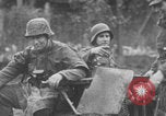 Standbild Schlacht in den Ardennen Deutschland, 1944, aus Sekunde 45 historischem Filmmaterial Videoclip 65675078934