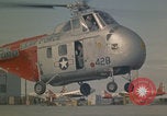 Standbild Sikorsky H-19 Chickasaw Hubschrauber fliegen Keflavik Reykjanes Island, 1956, aus Sekunde 20 historischem Filmmaterial Videoclip 65675078962