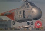 Standbild Sikorsky H-19 Chickasaw Hubschrauber fliegen Keflavik Reykjanes Island, 1956, aus Sekunde 28 historischem Filmmaterial Videoclip 65675078962