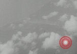 Standbild P-38 Blitze schießen Bougainville Island Papua Neuguinea, 1943, aus Sekunde 54 historischem Filmmaterial Videoclip 65675078973