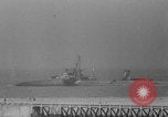 Image of Allied Military equipment and dead soldiers scattered Dunkirk France, 1940, second 16 stock footage video 65675078989