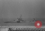 Image of Allied Military equipment and dead soldiers scattered Dunkirk France, 1940, second 17 stock footage video 65675078989