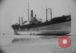 Image of Allied Military equipment and dead soldiers scattered Dunkirk France, 1940, second 18 stock footage video 65675078989