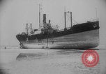 Image of Allied Military equipment and dead soldiers scattered Dunkirk France, 1940, second 19 stock footage video 65675078989