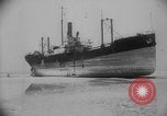 Image of Allied Military equipment and dead soldiers scattered Dunkirk France, 1940, second 20 stock footage video 65675078989