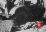 Image of Allied Military equipment and dead soldiers scattered Dunkirk France, 1940, second 25 stock footage video 65675078989