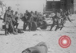 Image of Allied Military equipment and dead soldiers scattered Dunkirk France, 1940, second 26 stock footage video 65675078989