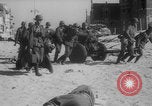 Image of Allied Military equipment and dead soldiers scattered Dunkirk France, 1940, second 27 stock footage video 65675078989