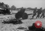 Image of Allied Military equipment and dead soldiers scattered Dunkirk France, 1940, second 31 stock footage video 65675078989