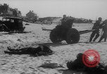 Image of Allied Military equipment and dead soldiers scattered Dunkirk France, 1940, second 32 stock footage video 65675078989