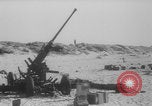 Image of Allied Military equipment and dead soldiers scattered Dunkirk France, 1940, second 33 stock footage video 65675078989